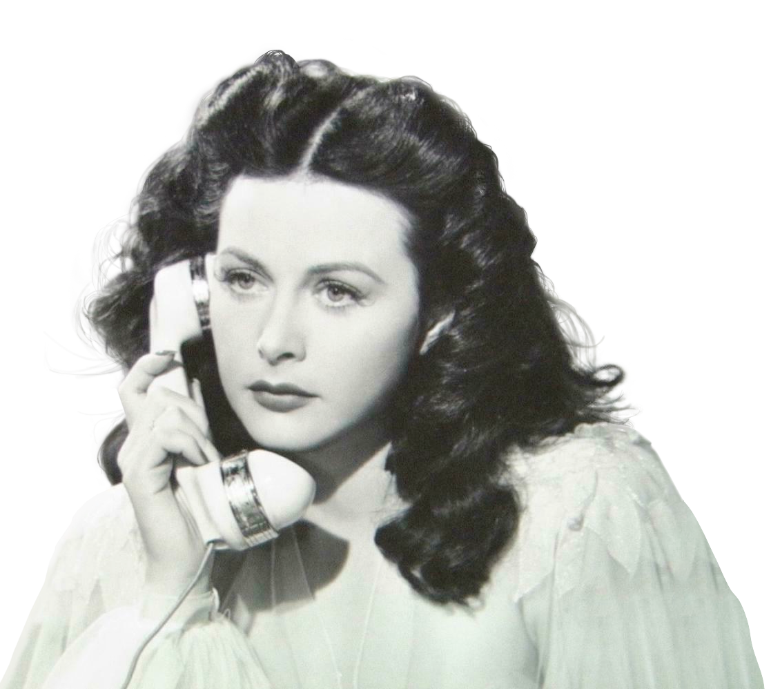 Black and white photo of Hedy Lamarr speaking into a telephone and looking to the side