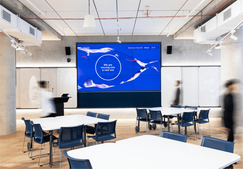 The large Flow Wall screen display inside the building's lobby