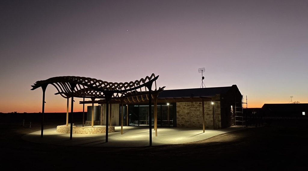 The visitor's precinct photographed at night